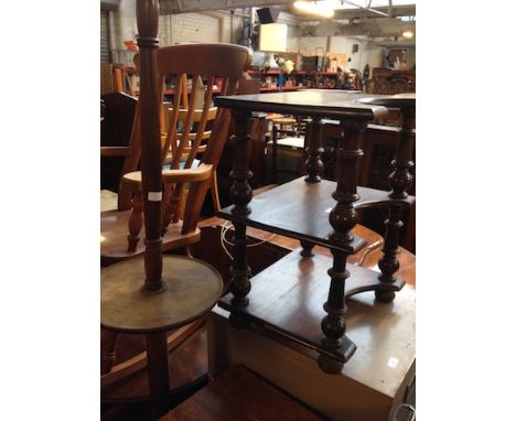 A 3 TIER WOODEN STAND AND A STANDARD LAMP