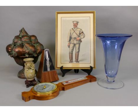 A walnut cased wheel barometer thermometer, 46cm high, a West German metronome, a Spy print 'Thorough!', a gilded vase of fru