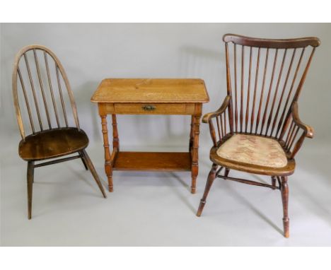 An Edwardian light oak two tier side table, with drawer, 71cm wide x 43cm diameter x 72cm high, a similar period comb back op