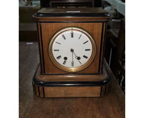 A Victorian mahogany cased mantel clock, white enamel dial 