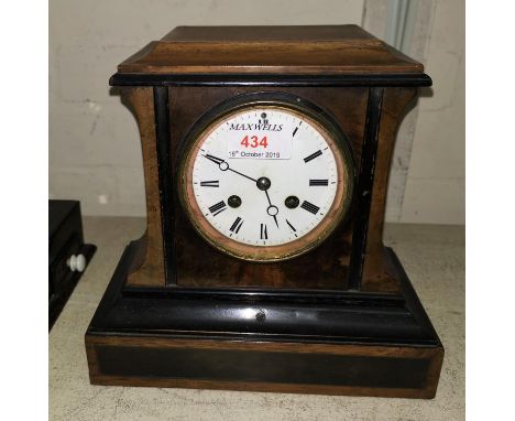 A 19th century mantel clock in walnut case with ebonised mouldings, striking French movement 