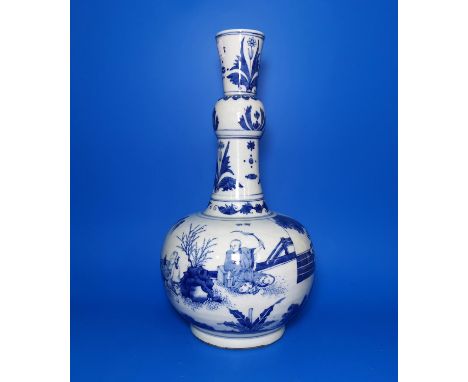 A Chinese blue and white ceramic gourd vase with elongated neck and garlic mouth, decorated with traditional scenes, ht 38cm