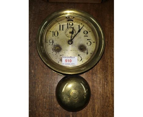 A Seth Thomas ships alarm clock, brass face 