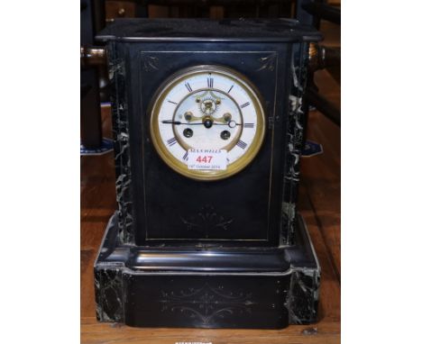 A 19th century mantel clock in black marble case, with visible escapement and French striking movement 