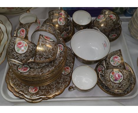 A SALISBURY Crown China porcelain tea service, enamelled flowers on open gilt ground, 41 pieces, a part COALPORT set and a St