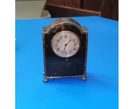 A silver and tortoiseshell cased mantel clock with 8 day movement, marks worn 