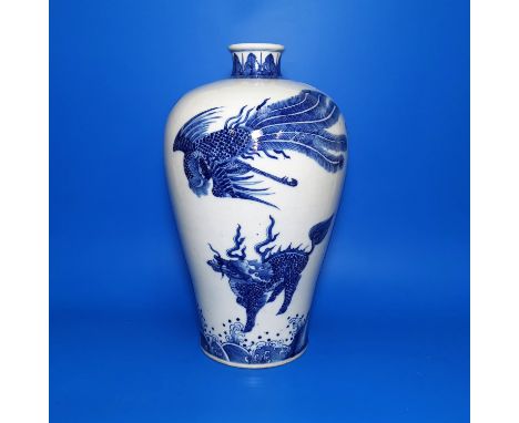 A large Chinese ceramic blue and white plum shape vase decorated with Phoenix and other mystical creatures, ht 39cmCondition 