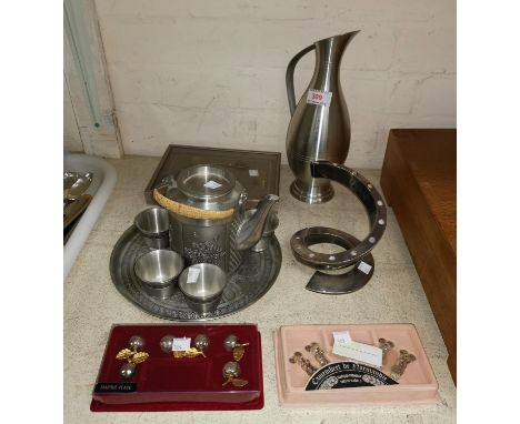 A Danish silvered metal table centre of unusual spiral design; EPNS cruet ware; pewter ware; place card holders; etc. 