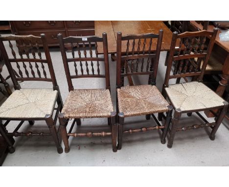 A matched set of 4 chairs with bobbin backs and rush seats 