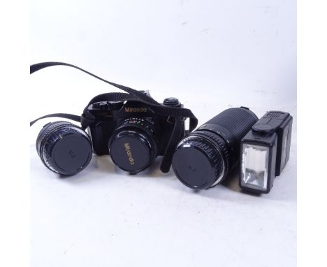 A Miranda camera with lenses and accessories in case 