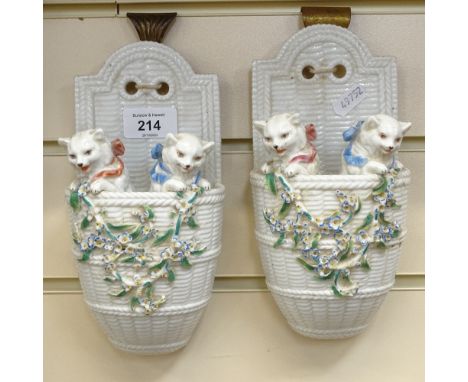 A pair of Victorian glazed ceramic kitten wall pockets, by W T Goode of London, height 21cm 