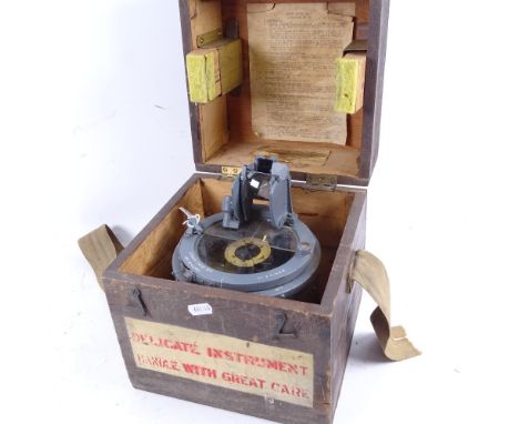 A wooden-cased gimballed bomber compass, type 02A 