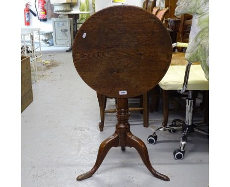 A small Georgian oak tilt-top table, on tripod base, W51cm 