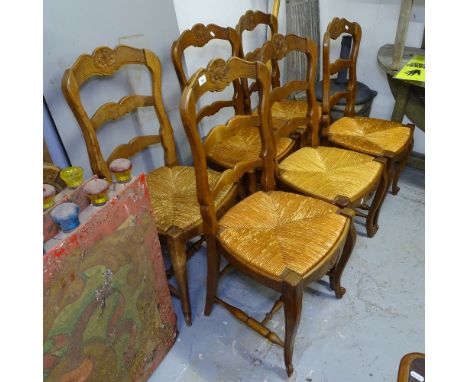 A set of 6 French oak ladder-back dining chairs 