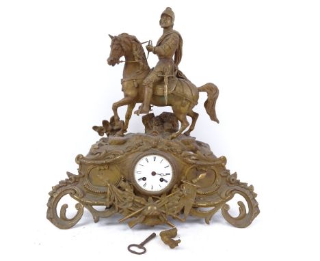 A large 19th century brass figural 8-day mantel clock, surmounted by a knight on horseback, case height 48cm 