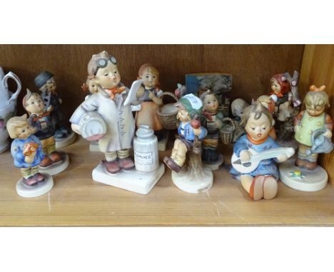 A collection of Hummel figures, tallest 14.5cm 