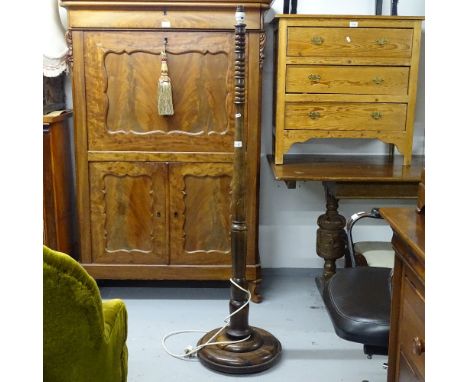 An Edwardian oak turned standard lamp and shade 