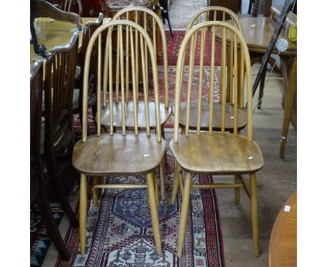 A set of 4 mid-century elm-seated stick-back dining chairs 