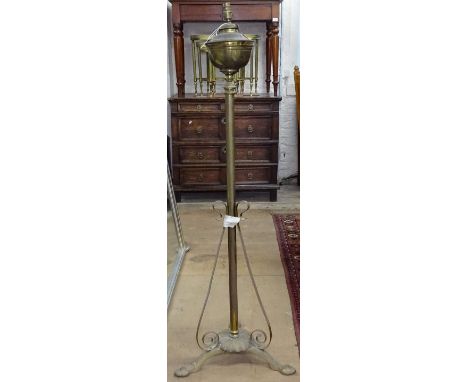 A Victorian brass standard lamp converted to electric 