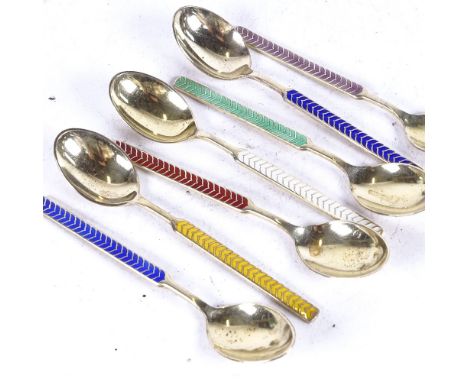 A set of 7 sterling silver and coloured enamel teaspoons, by Meka, Denmark, boxed 