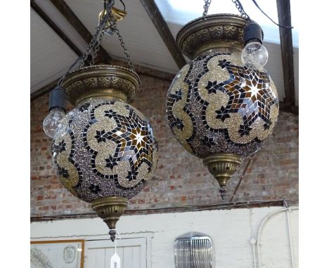 A pair of Middle Eastern Islamic brass and mirror mosaic hanging lanterns, lantern height 40cm 