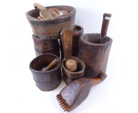 A pair of coopered oak barrels with iron bands, 23cm, 19th century carved wood pots and bowls, a scoop, comb etc 