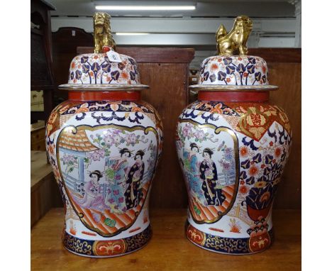 A pair of large Chinese design ceramic baluster vases and lids, with enamel and gilded decoration, H61cm 