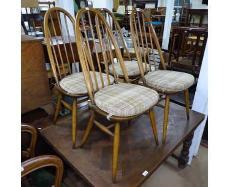 A set of 4 Ercol Quaker dining chairs with original cushions 
