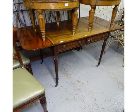 A Regency mahogany sofa table, with 2 frieze drawers, raised on ring turned legs, W90cm, H69cm 