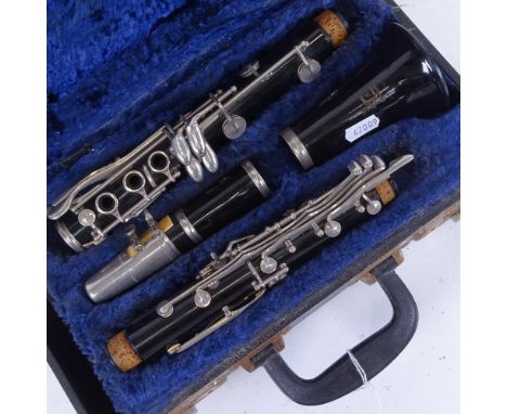 A Vintage black lacquered Boosey &amp; Hawkes 4-section clarinet, overall length 68cm, in fitted hardshell case 
