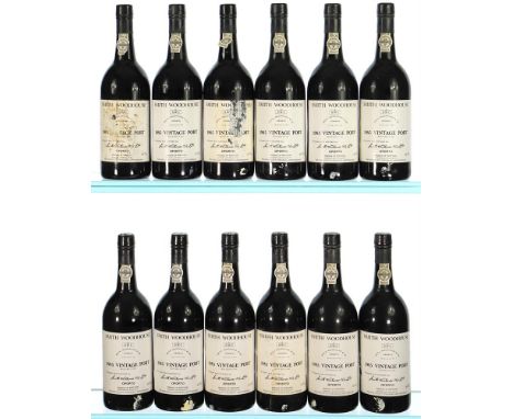 1985 Smith Woodhouse, Vintage Port 12x75cl  Damaged labels