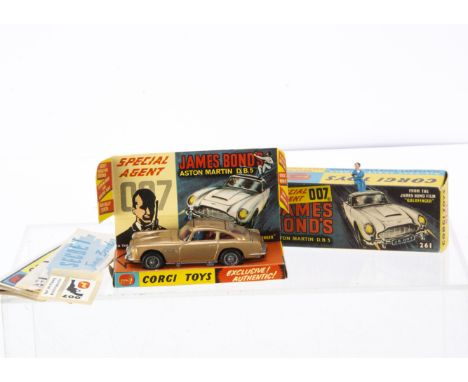 A Corgi Toys 261 James Bond's Aston Martin D.B.5, gold body, red interior, wire wheels, Bandit figure, in original box with i