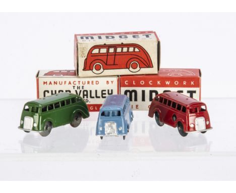 Chad Valley Clockwork Diecast Midget Coaches, three examples, green, red, light blue, in original boxes, VG-E, light blue wit