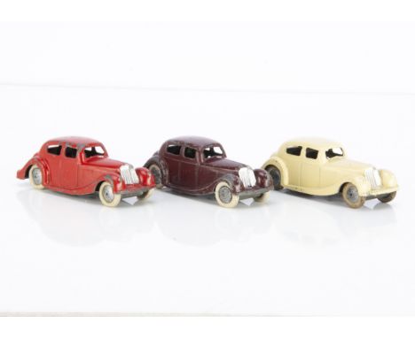 Brimtoy Pocketoy Clockwork No.502 Sunbeam Talbot, three examples, cream, red, maroon, all with metal hubs and white tyres, F-