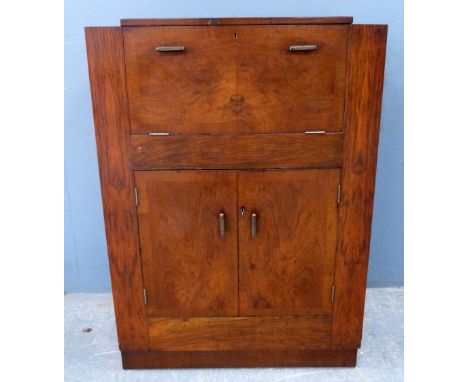 Art Deco walnut drinks cabinet with folding top opening to reveal a mirrored serving console, 109 x 77 x 36 cm. 