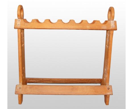 Light oak stick stand with the pierced end supports with Gothic revival decoration, 76 x 72 x 28   