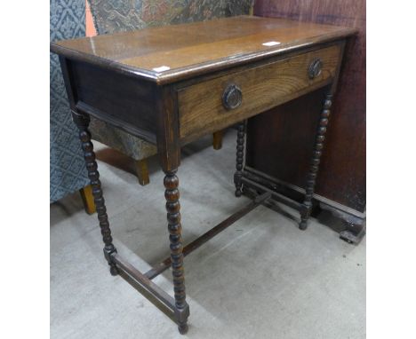 An oak bobbin turned single drawer side table 