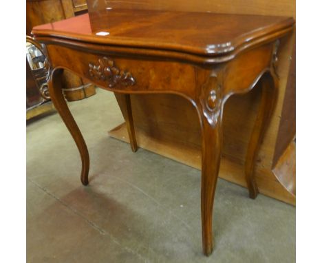 A 19th Century style French burr walnut serpentine fold over card table 