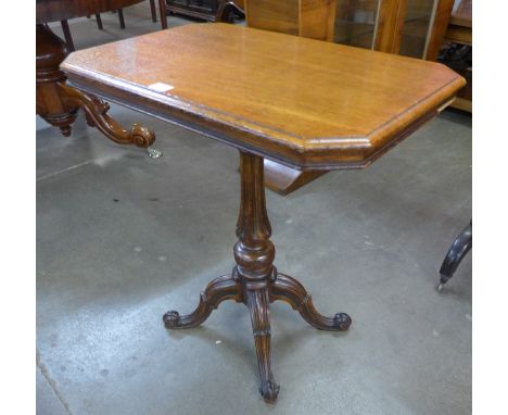 A Victorian octagonal carved oak lamp table, manner of Gillows, Lancaster 