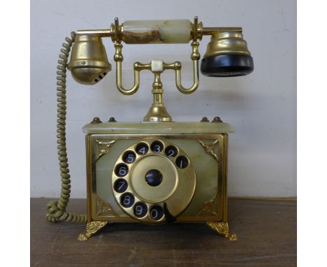 A vintage onyx and brass telephone 
