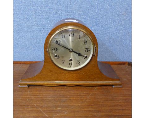 An early 20th Century oak mantel clock, the dial signed Barwick &amp; Haugas, Keightly 