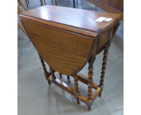 A small oak bobbin turned gateleg occasional table 