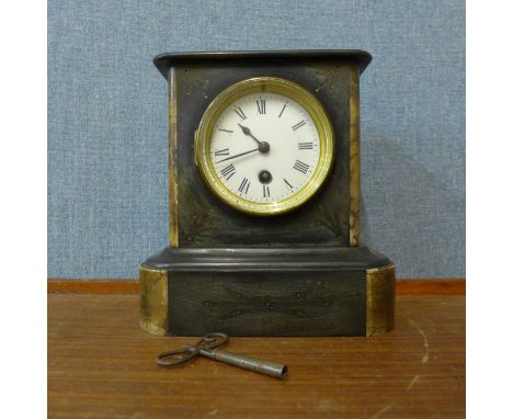 A 19th Century French Belge noir mantel clock 