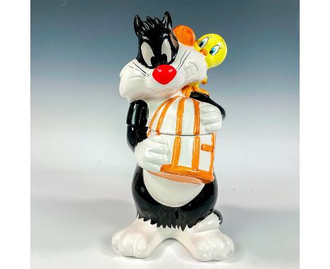 Ceramic lidded jar modeled as Sylvester holding Tweety's bird cage while Tweety is holding a mallot. Certified International 
