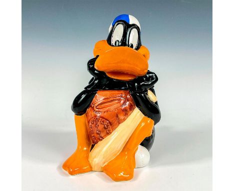 Ceramic lidded jar modeled as Daffy Duck seated wearing his baseball cap, holding his mitt and bat. Certified International C