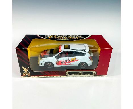 A factory sealed, replica die cast metal model car Pontiac Vibe Turned designed in a white and black colored exterior and red