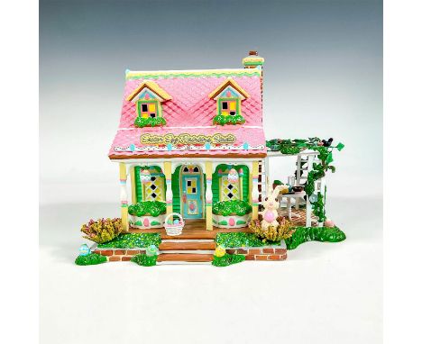 The Original Snow Village series; a ceramic figure of an adorable building decorated for Easter. Incudes an interior light fi