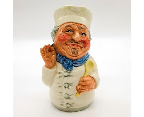 White chef's coat and hat; blue scarf.Series: The Doultonville Collection. Royal Doulton backstamp. Artist: William K. Harper