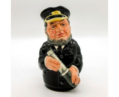 Blue-black coat; blue-black cap trimmed with yellow.Series: The Doultonville Collection. Royal Doulton backstamp. Artist: Wil
