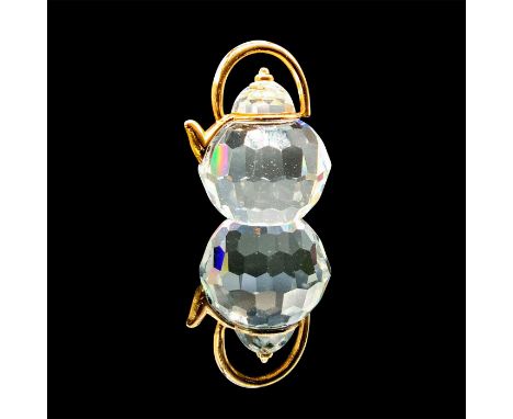 A clear faceted kettle with gold accents. This item has its original box: 3.5"L x 2.25"W x 1.25"H. Artist: Anton PoppingerIss